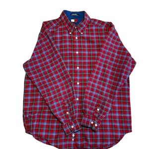 This is a Tommy Hilfiger Red Plaid Button Down Shirt. Men’s size Large.